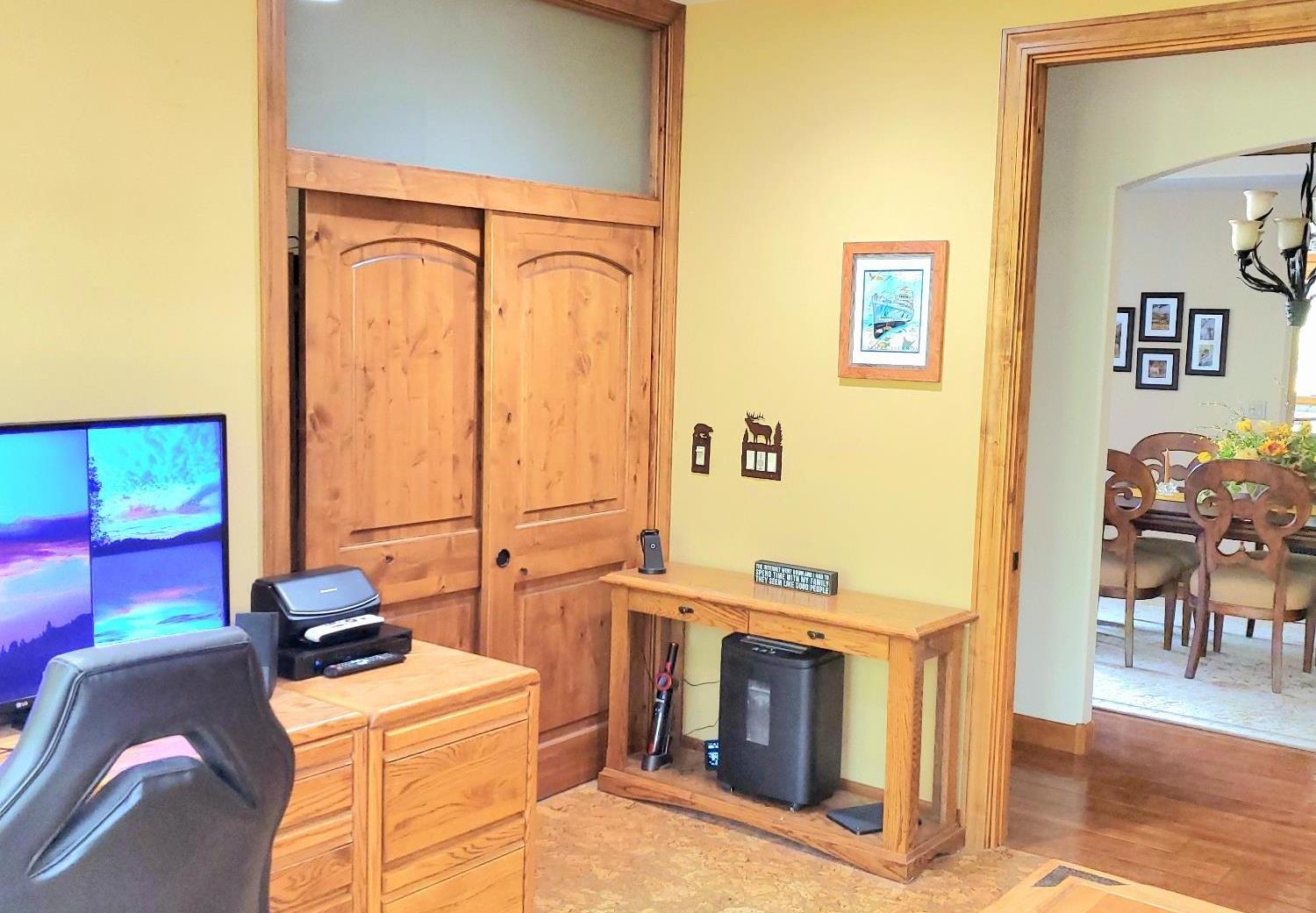 1440 Dog Bar Road Colfax, CA 95713 - Photo 63 of 93 Bedroom 3/home office with recessed lighting, a chandelier, ceiling fan, and cork floors.
