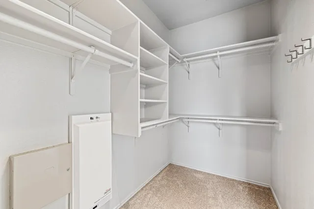a view of an empty walk in closet