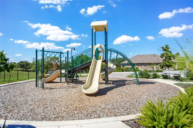a view of a park with slide