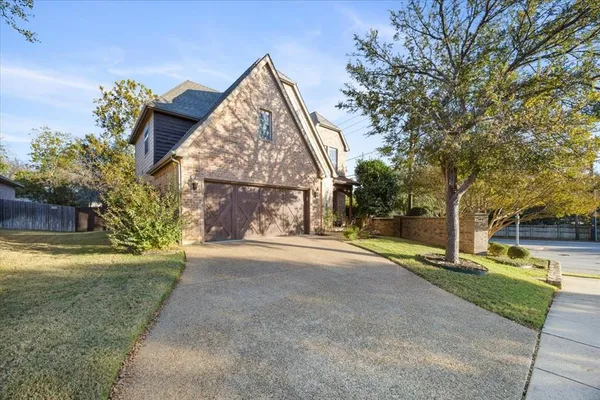 a view of a trees in front of a house