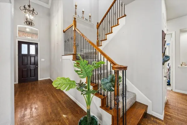 a view of walk in closet with clothes