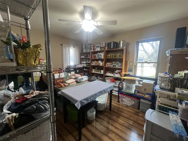 a view of a workspace with furniture and a livingroom