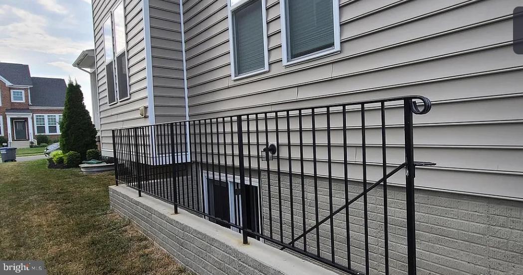 24800 Beardgrass Place Aldie, VA 20105 - Photo 16 of 25 a view of a black gate