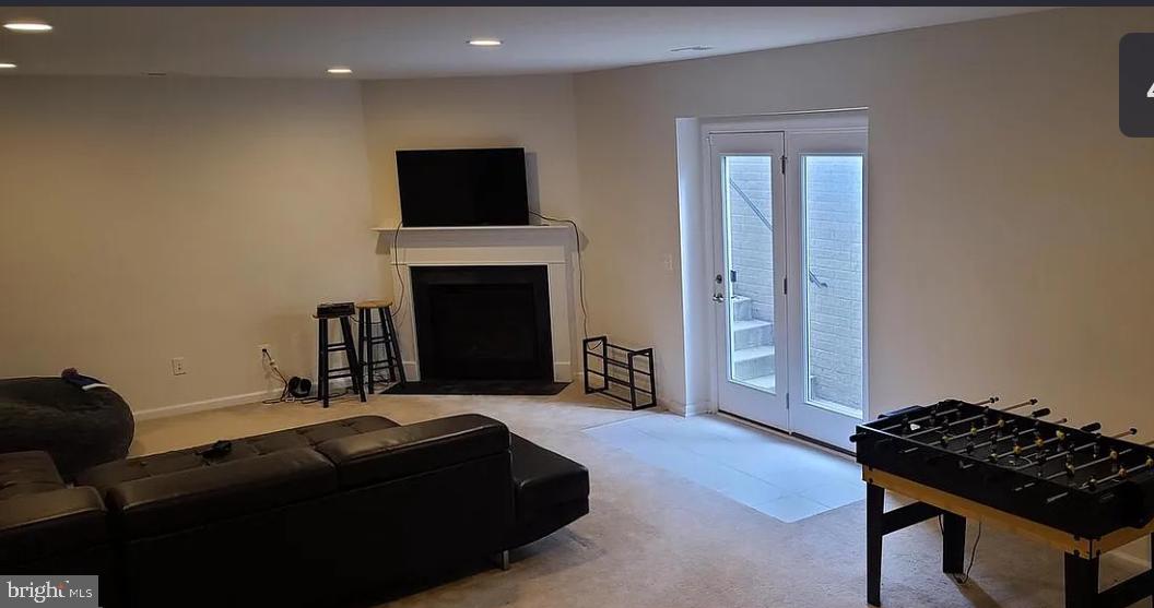 24800 Beardgrass Place Aldie, VA 20105 - Photo 4 of 25 a bedroom with a bed and a television