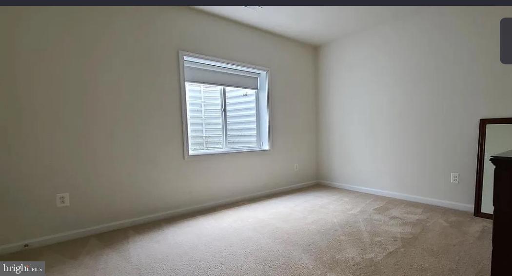 24800 Beardgrass Place Aldie, VA 20105 - Photo 7 of 25 an empty room with a window