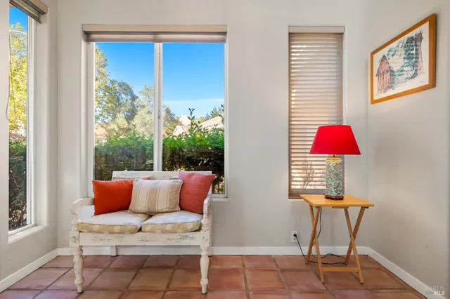 a outdoor living space with furniture and a window