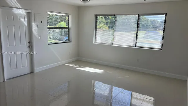 an empty room with a window