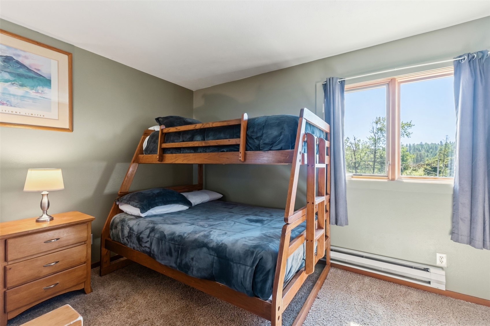 6734 Ryan Gulch Road, Unit 6734 Silverthorne, CO 80498 - Photo 22 of 33 a bedroom with a bed and a window