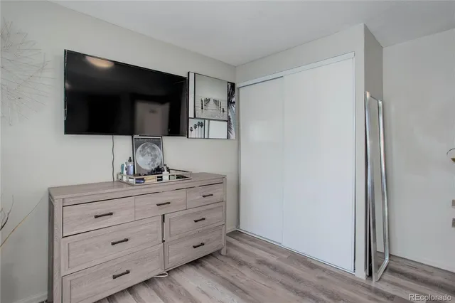 a living room with flat screen tv