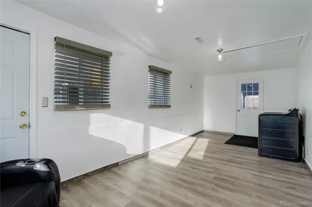 a view of livingroom with furniture and windows