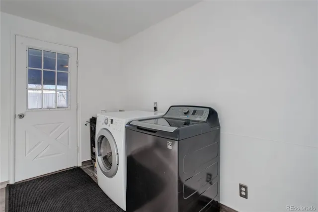 a utility room with dryer and washer