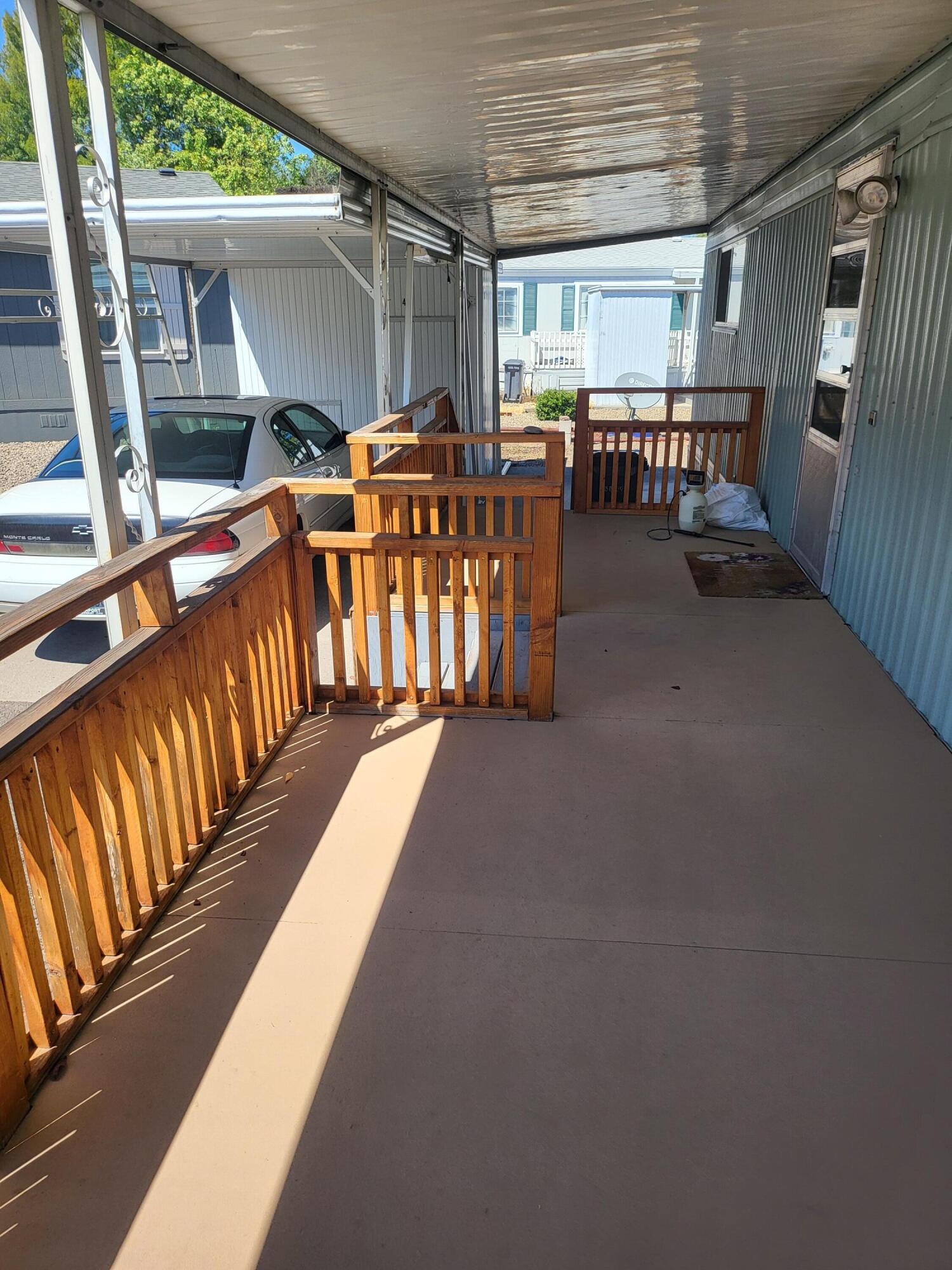 2385 Table Rock Road, Unit 46 Medford, OR 97501 - Photo 4 of 24 deck with covered awning