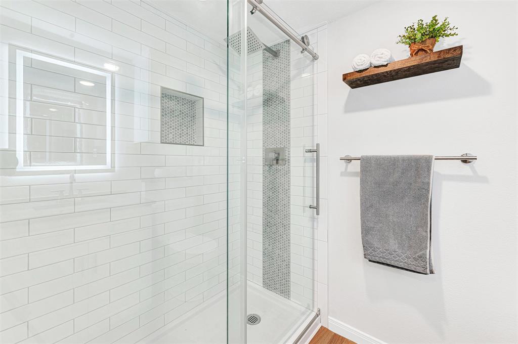 2809 Rio Branco Street, Unit 102 Farmers Branch, TX 75234 - Photo 17 of 21 a bathroom with a shower