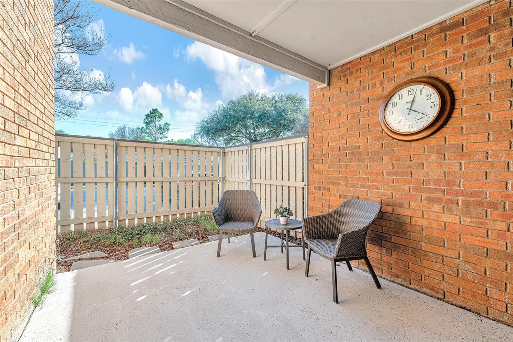 2809 Rio Branco Street, Unit 102 Farmers Branch, TX 75234 - Photo 19 of 21 a view of a chair with a outdoor space