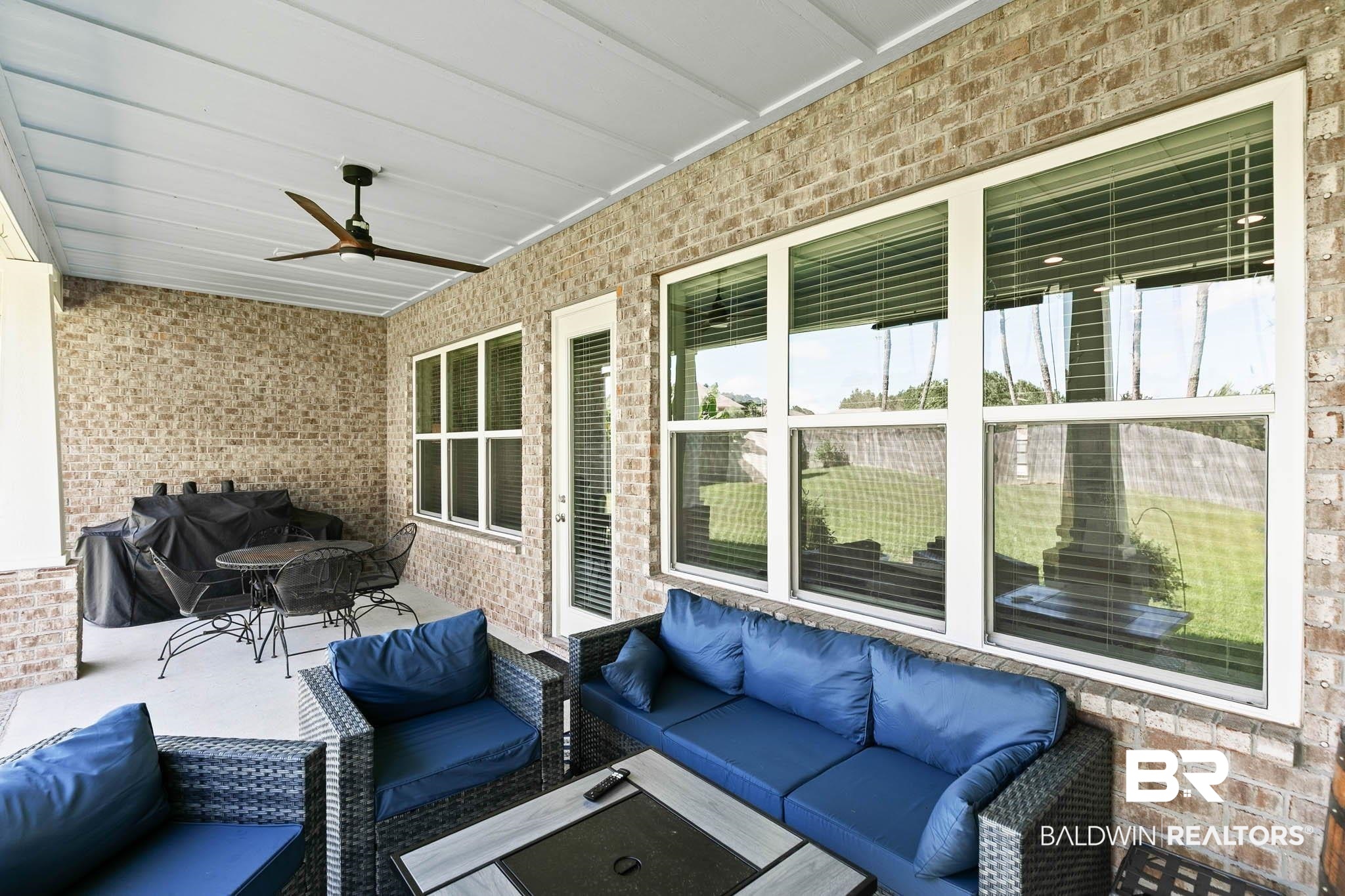 12785 Warbler Street Daphne, AL 36527 - Photo 34 of 53 View of patio with an outdoor hangout area, ceiling fan, and grilling area