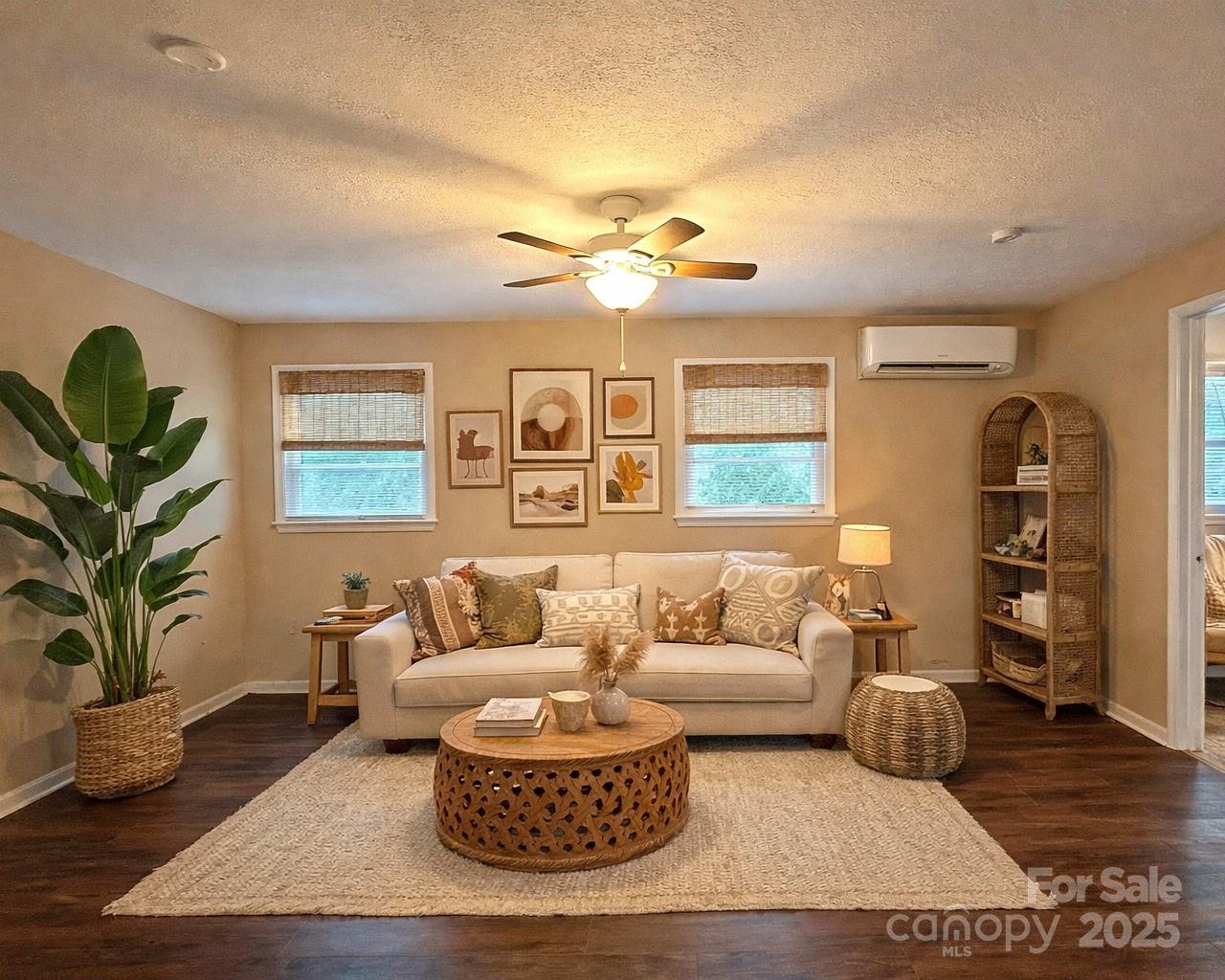 9 Riddle Road Swannanoa, NC 28778 - Photo 3 of 21 a living room with furniture and a wooden floor
