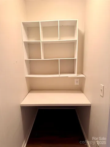 a kitchen with a stove and a refrigerator