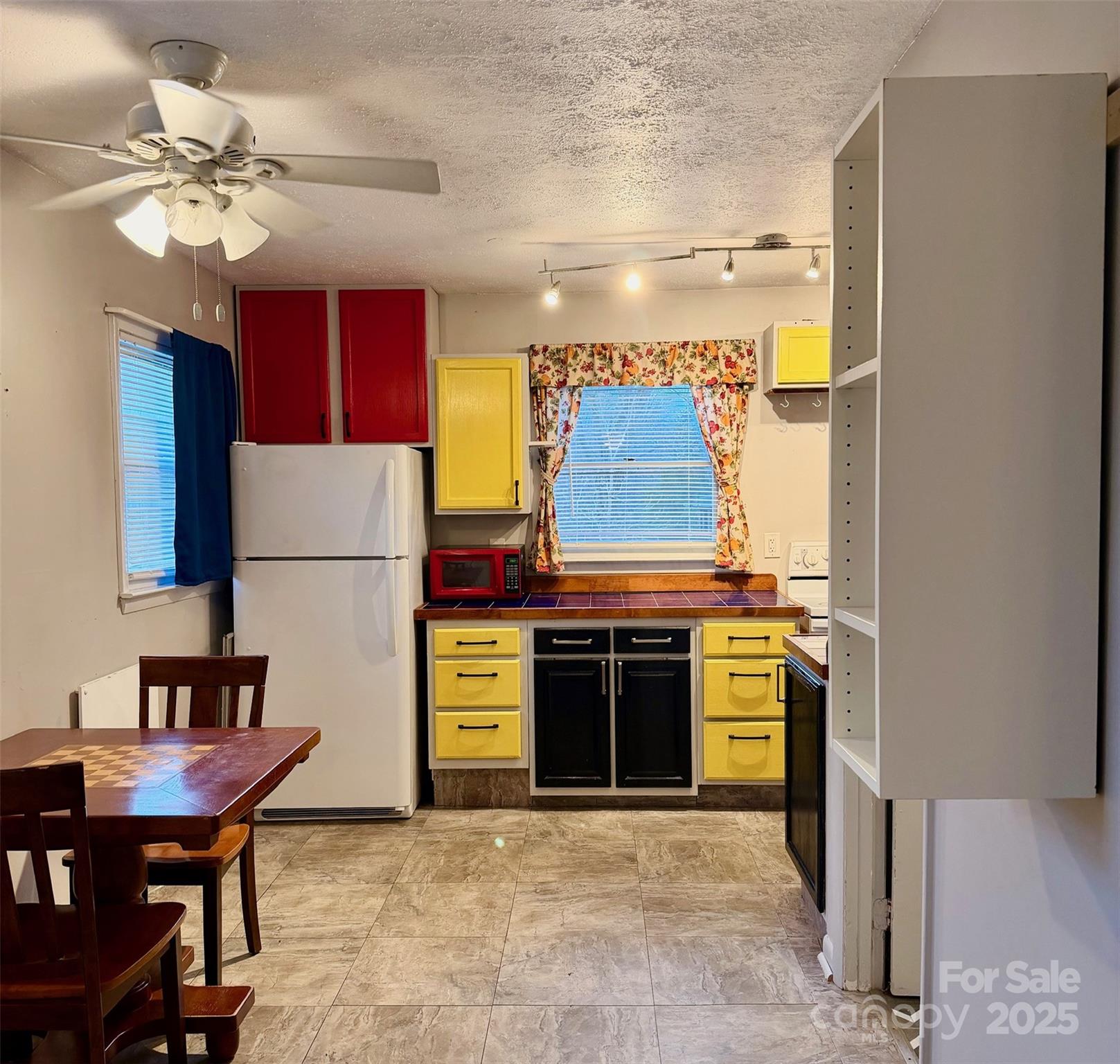 9 Riddle Road Swannanoa, NC 28778 - Photo 10 of 21 a view of kitchen with furniture and a fireplace
