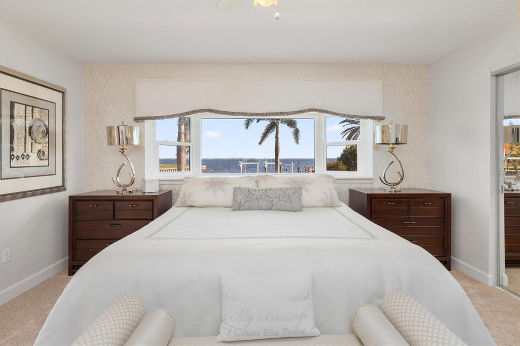 374 Severin Road Southeast Port Charlotte, FL 33952 - Photo 24 of 67 a bedroom with a bed and a window