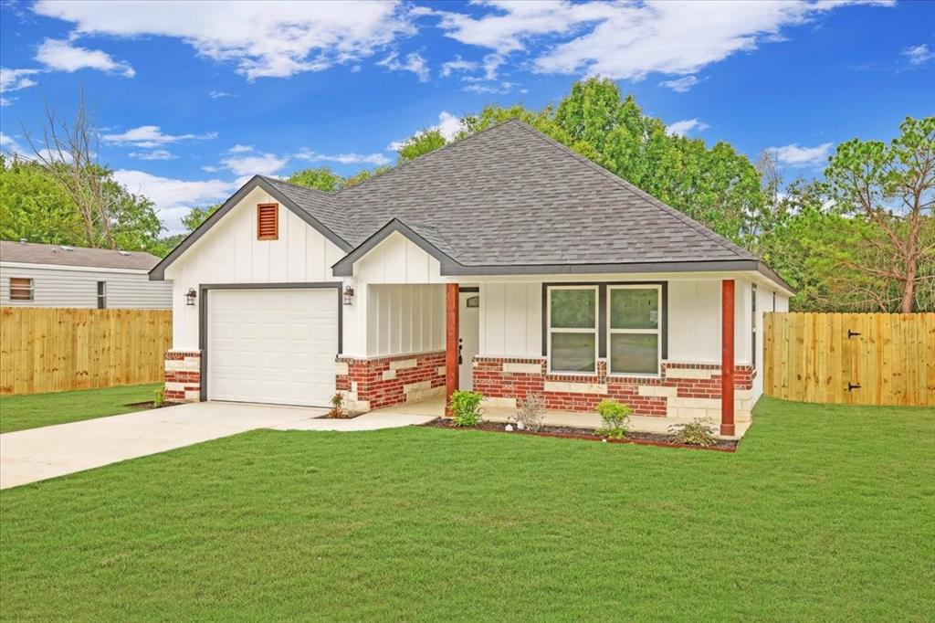 111 North Oak Street Ector, TX 75439 - Photo 11 of 34 a front view of house with yard and outdoor seating