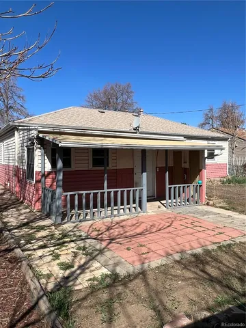 a front view of a house with a porch