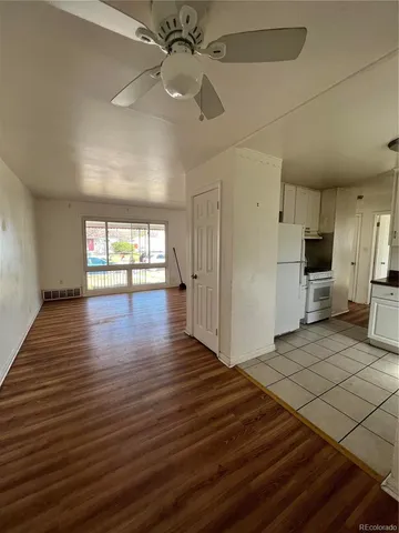a view of a livingroom with wooden floor