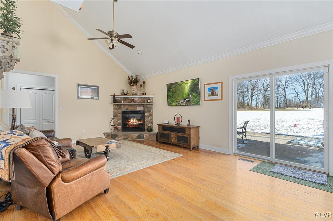 2930 Willow Street Coplay, PA 18037 - Photo 17 of 50 a living room with furniture a flat screen tv and a large window