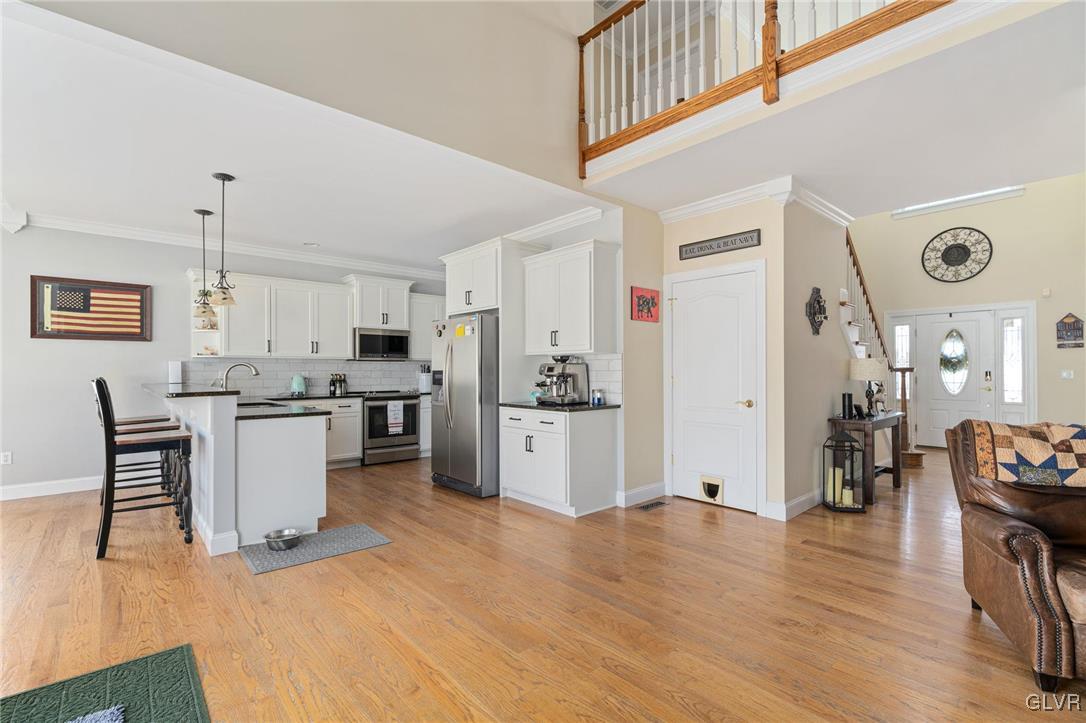 2930 Willow Street Coplay, PA 18037 - Photo 21 of 50 a kitchen with a refrigerator and wooden floor
