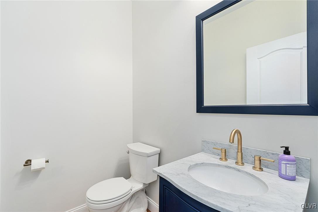 2930 Willow Street Coplay, PA 18037 - Photo 29 of 50 a bathroom with a sink a toilet and mirror