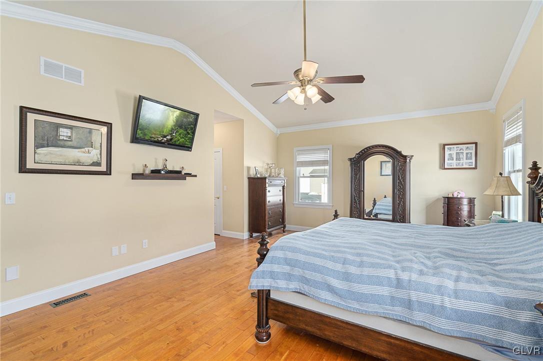 2930 Willow Street Coplay, PA 18037 - Photo 31 of 50 a bedroom with a large bed and a flat screen tv