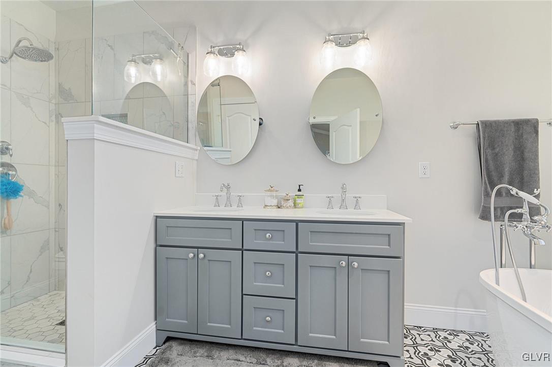 2930 Willow Street Coplay, PA 18037 - Photo 33 of 50 a bathroom with a double vanity sink and a mirror