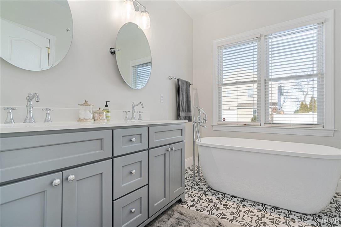 2930 Willow Street Coplay, PA 18037 - Photo 34 of 50 a spacious bathroom with 2 sink bathtub and a mirror