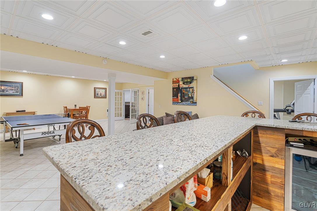 2930 Willow Street Coplay, PA 18037 - Photo 43 of 50 a view of kitchen island with granite countertop living room