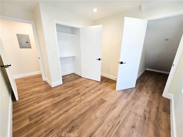 a view of wooden floor in an empty room