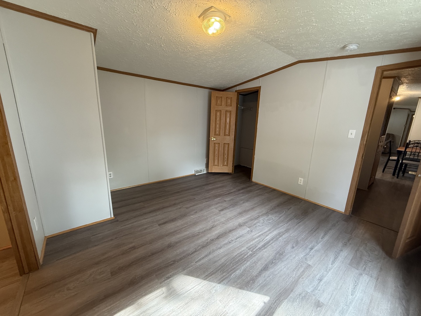 317 Pleasant Terrace Matteson, IL 60443 - Photo 11 of 23 a view of empty room with wooden floor
