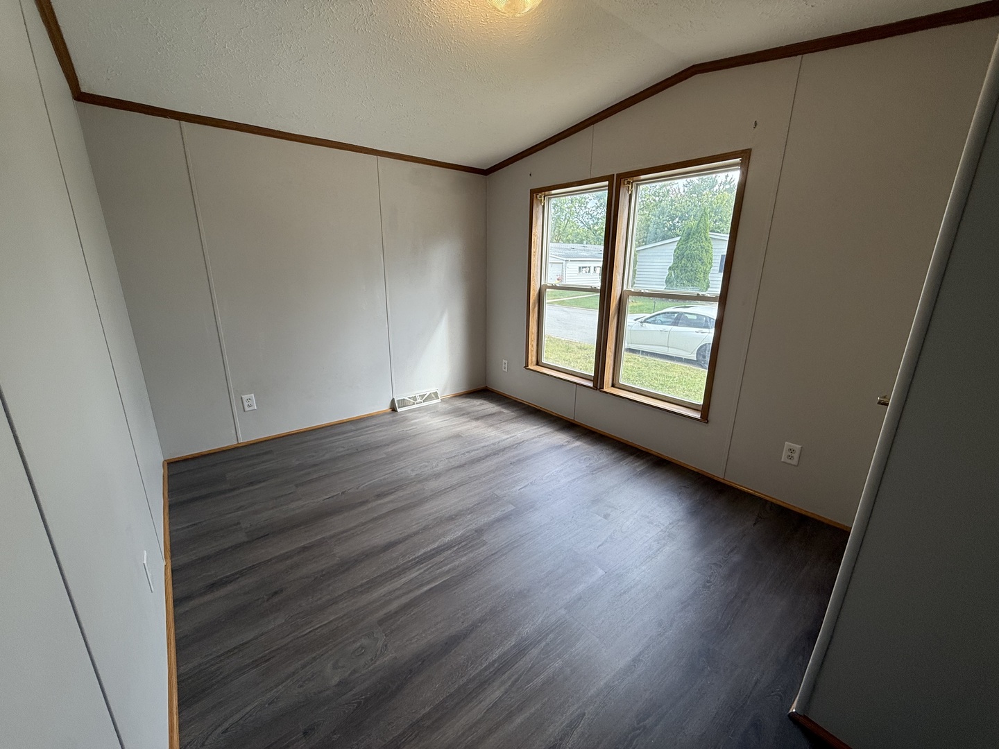317 Pleasant Terrace Matteson, IL 60443 - Photo 16 of 23 a view of a livingroom with wooden floor and window