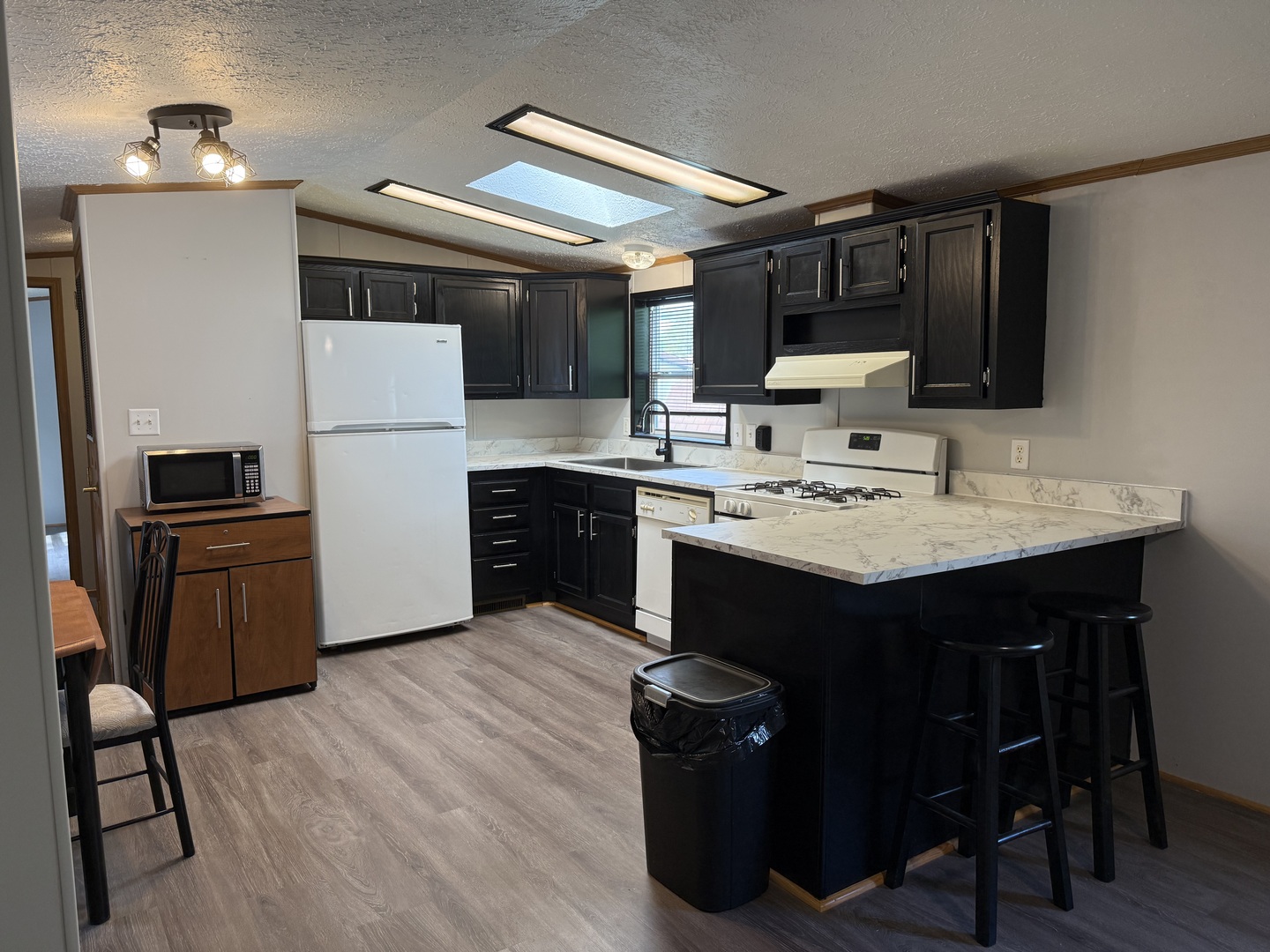317 Pleasant Terrace Matteson, IL 60443 - Photo 5 of 23 a kitchen with a sink appliances and cabinets