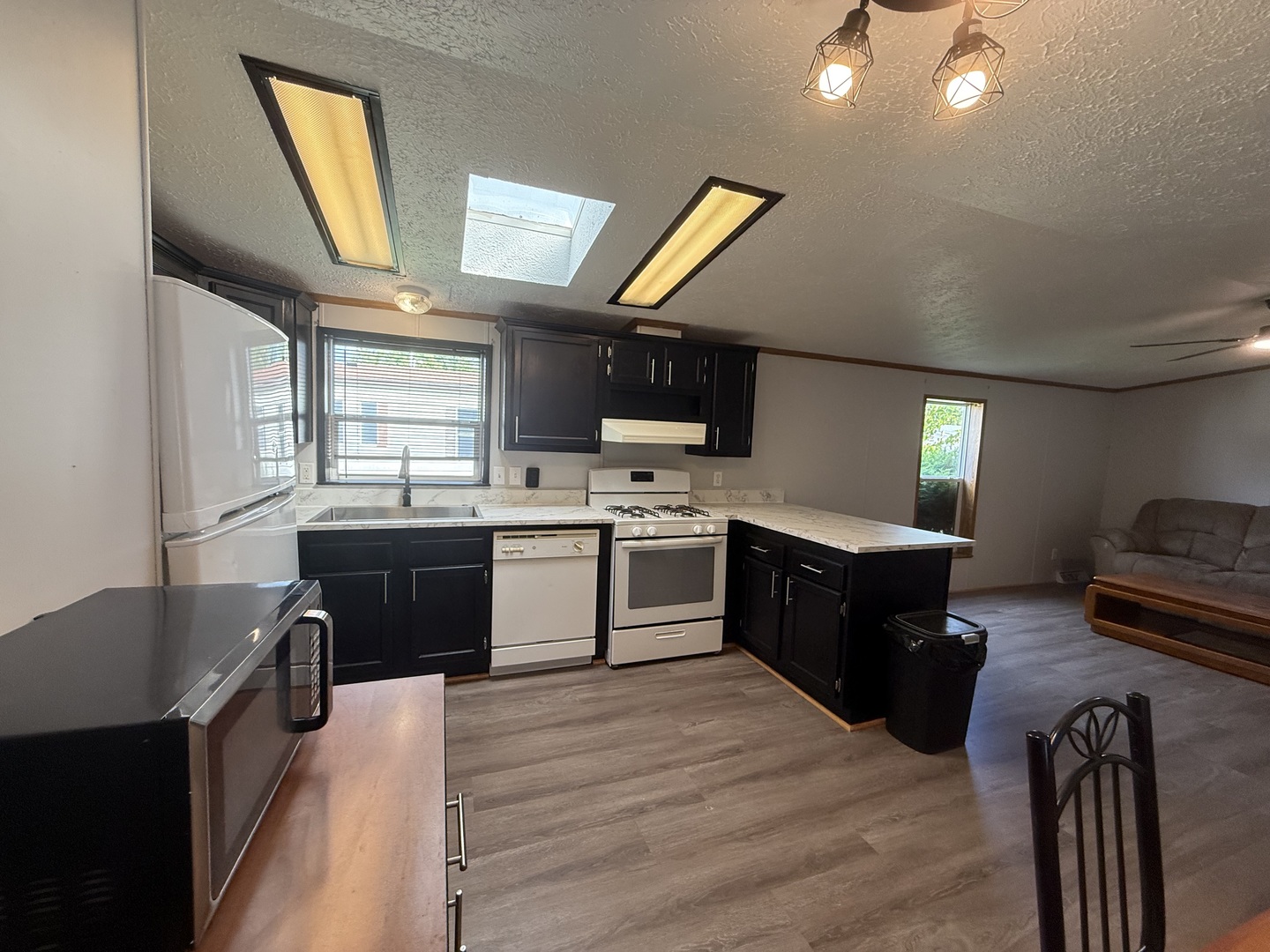 317 Pleasant Terrace Matteson, IL 60443 - Photo 7 of 23 a kitchen with a stove a sink and a refrigerator