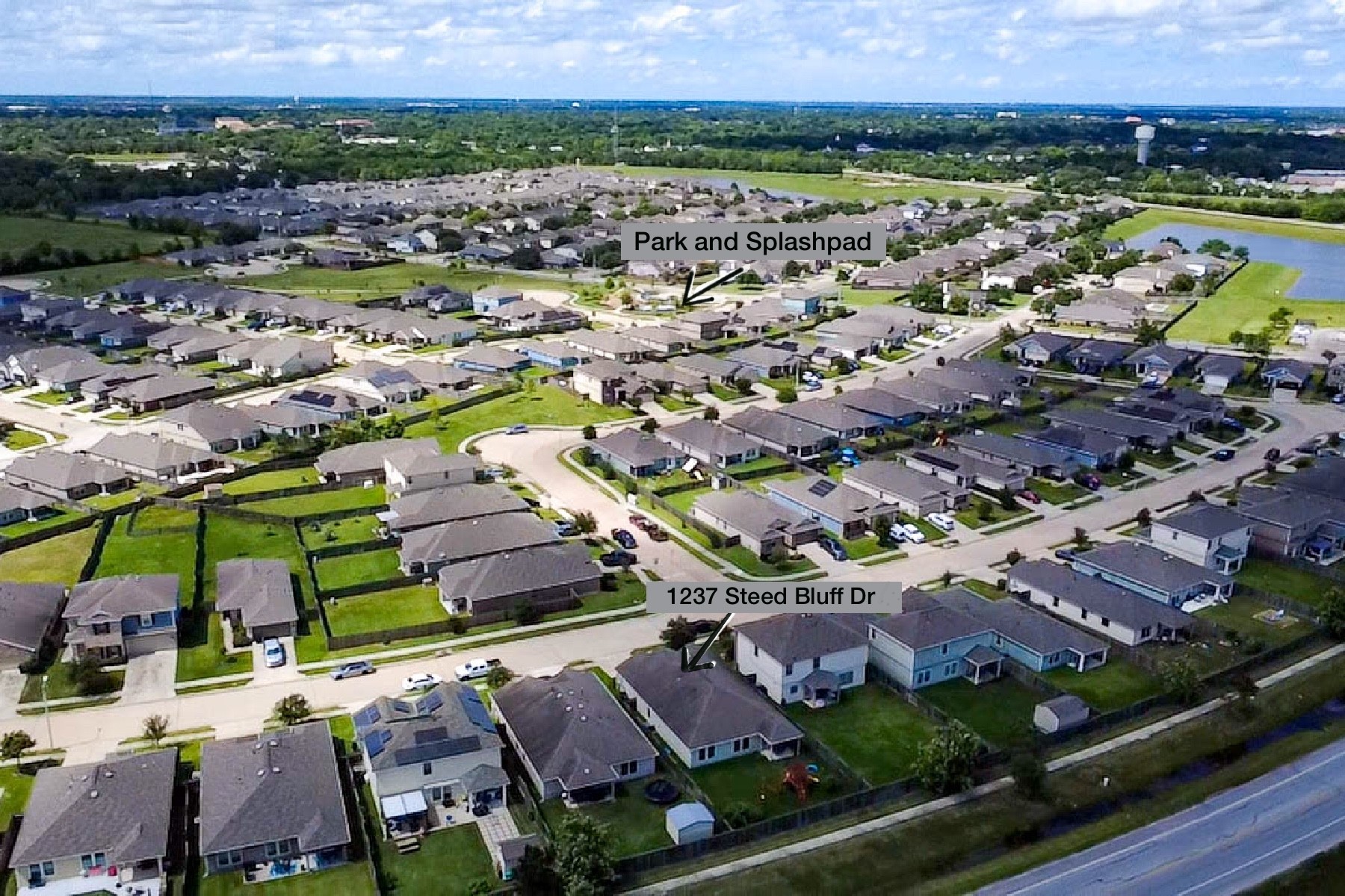 1237 Steed Bluff Drive Alvin, TX 77511 - Photo 2 of 50 Close proximity to the park and splash pad.