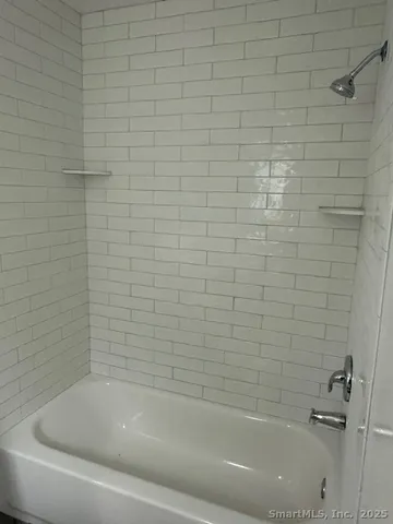 a bathroom with a bathtub