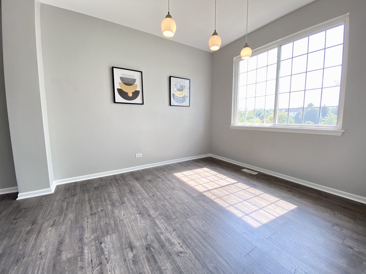 2443 Baldwin Court Aurora, IL 60503 - Photo 16 of 51 a view of wooden floor and windows in a room