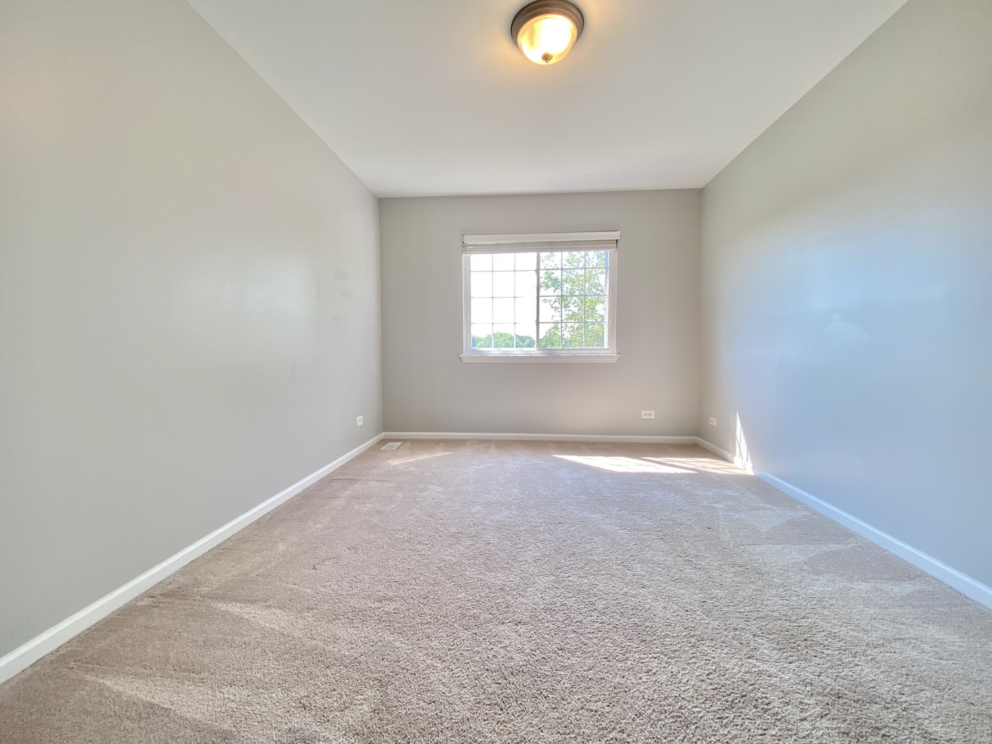 2443 Baldwin Court Aurora, IL 60503 - Photo 26 of 51 an empty room with windows