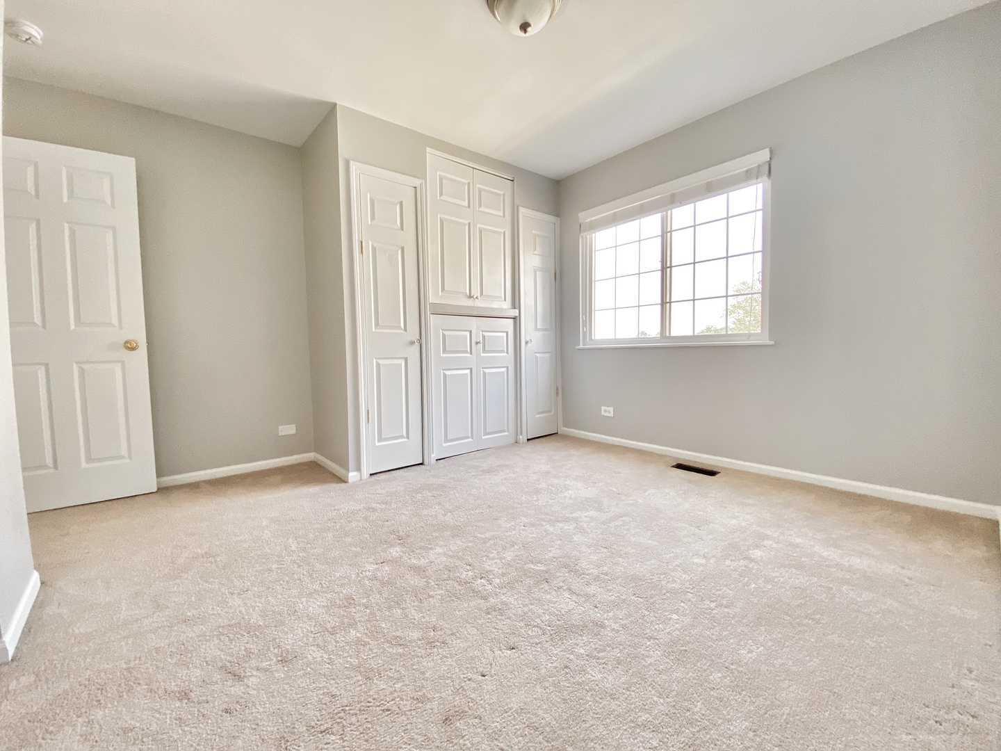 2443 Baldwin Court Aurora, IL 60503 - Photo 27 of 51 an empty room with windows