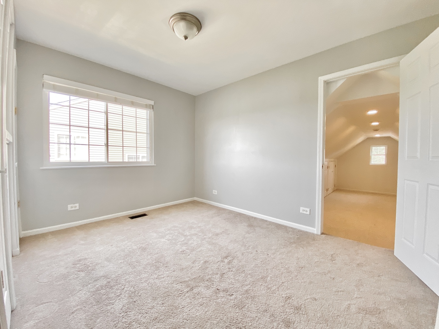 2443 Baldwin Court Aurora, IL 60503 - Photo 28 of 51 an empty room with windows and closet