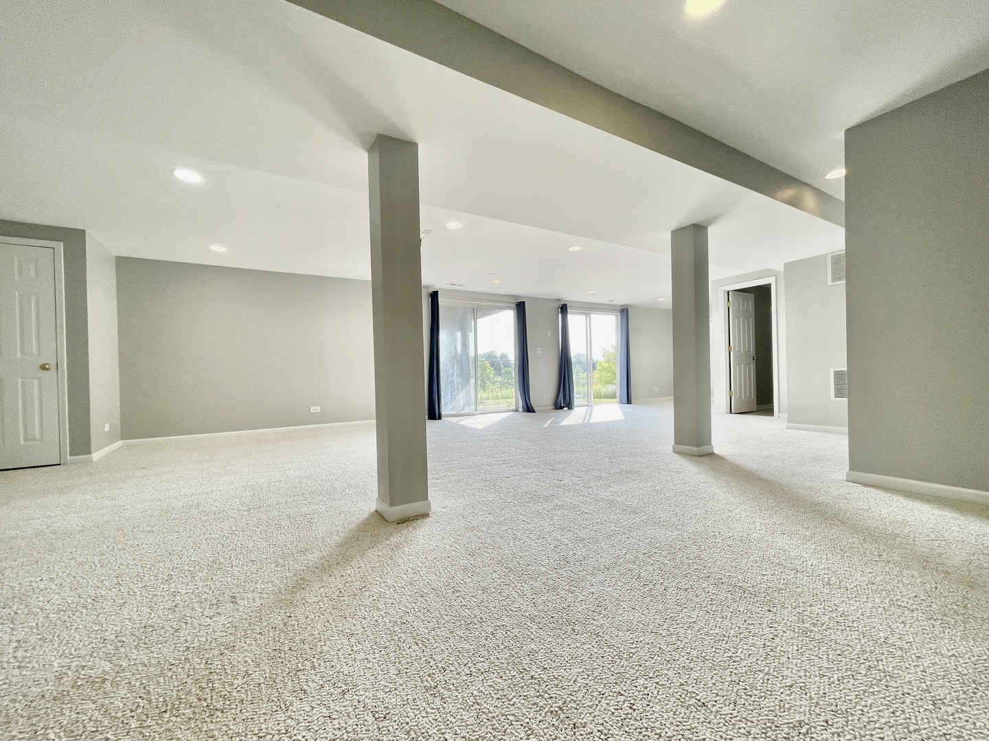2443 Baldwin Court Aurora, IL 60503 - Photo 34 of 51 a view of a big room with windows and brick walls