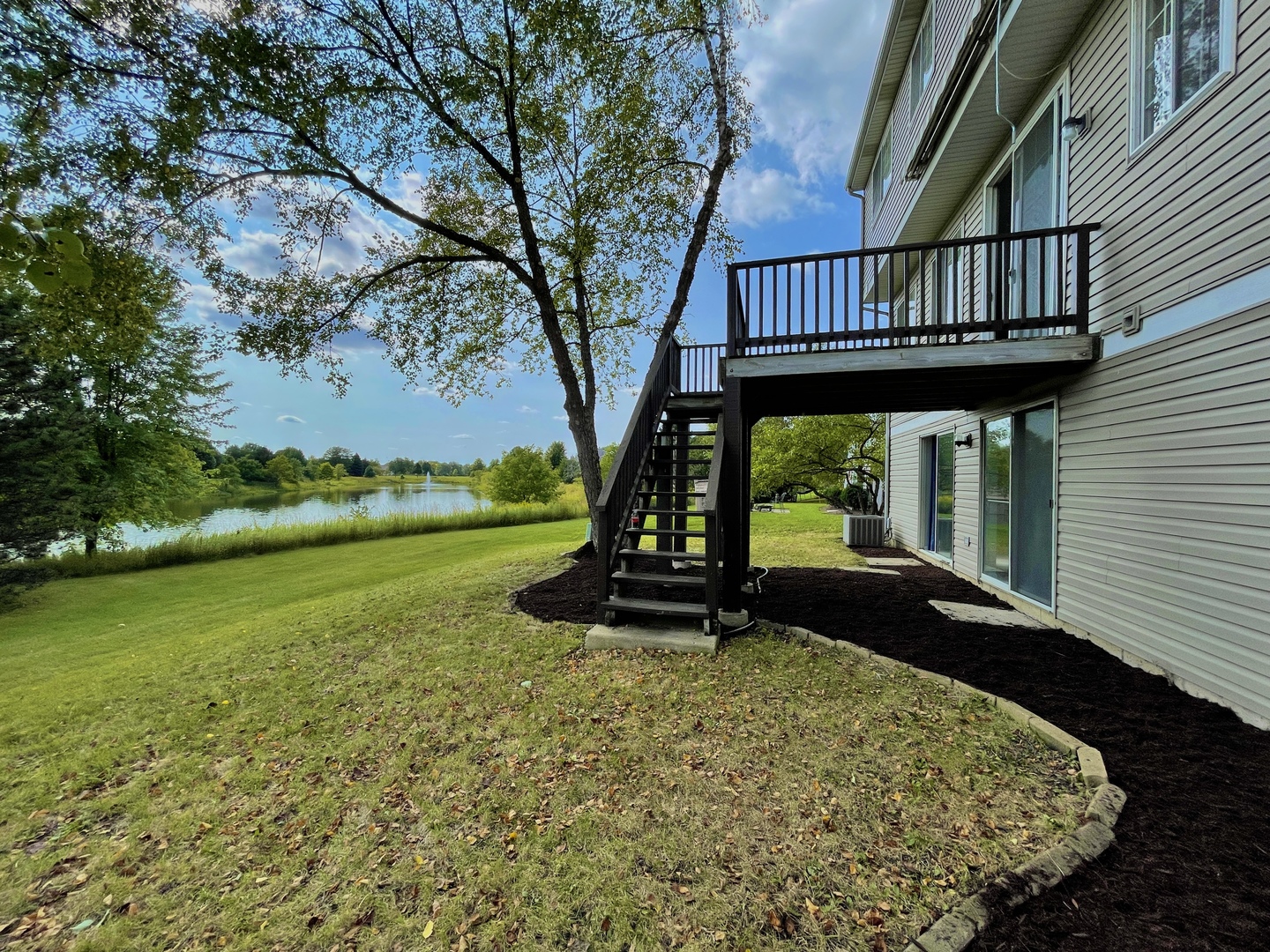 2443 Baldwin Court Aurora, IL 60503 - Photo 38 of 51 a view of a deck with a garden