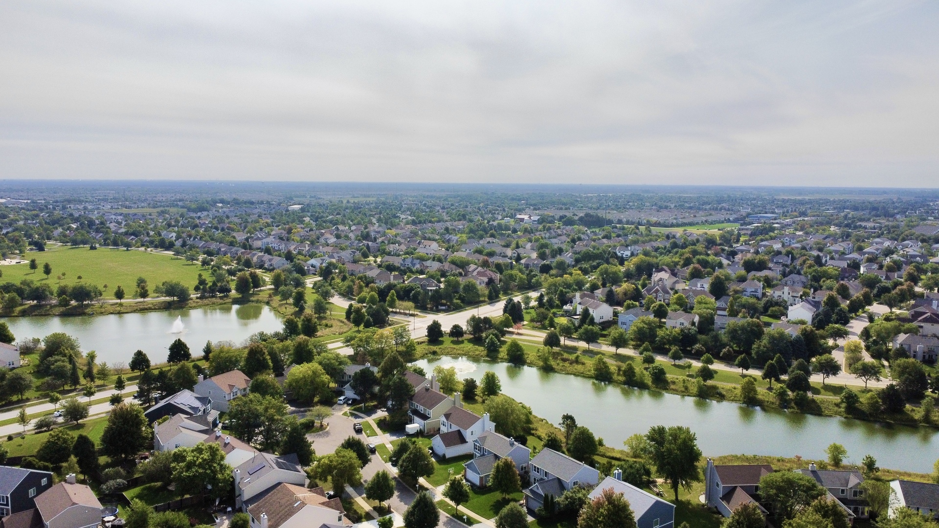 2443 Baldwin Court Aurora, IL 60503 - Photo 44 of 51 an aerial view of city and lake