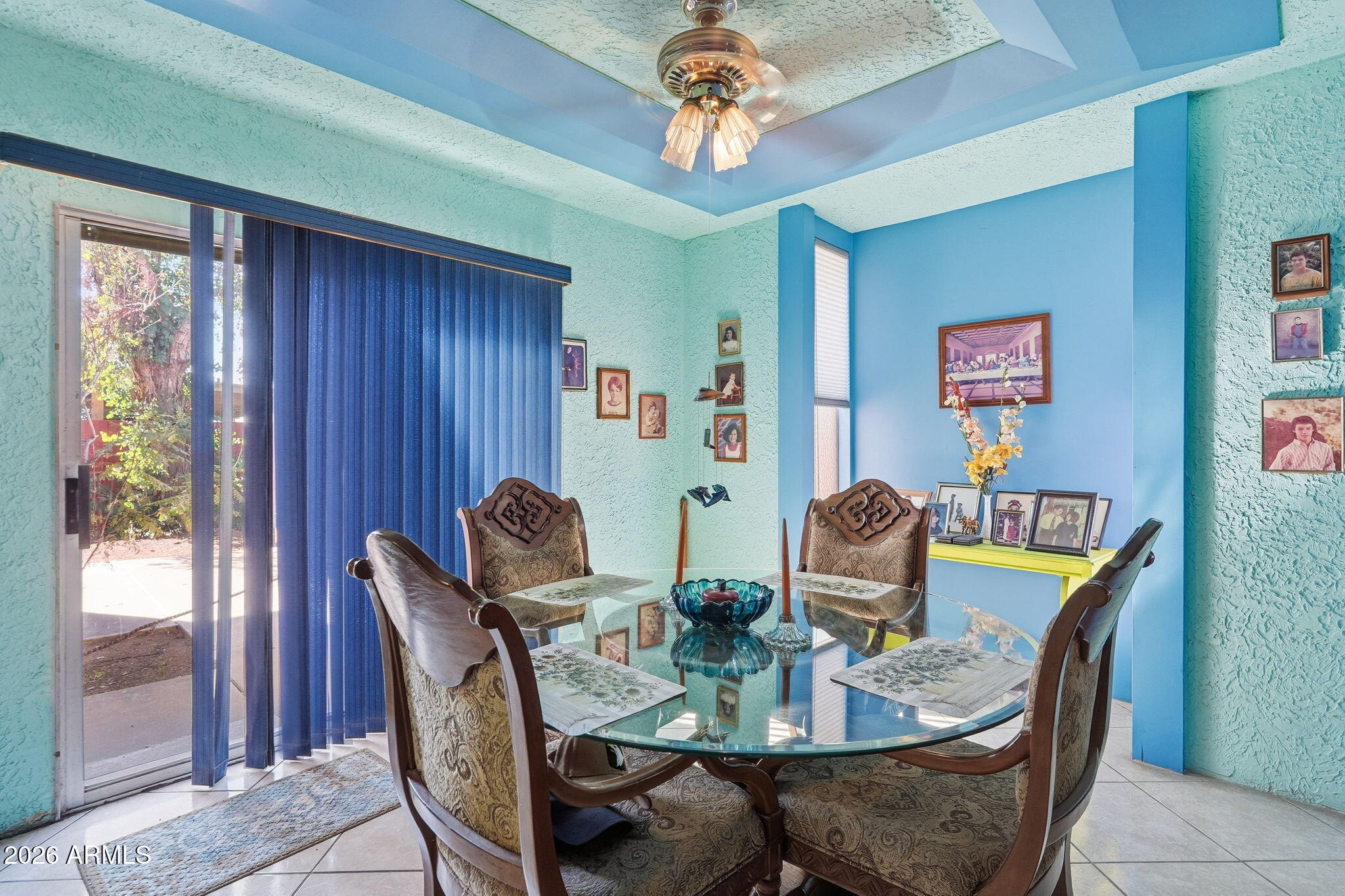 4702 East Alta Vista Road Phoenix, AZ 85042 - Photo 3 of 20 a view of a dining room with furniture window and outside view