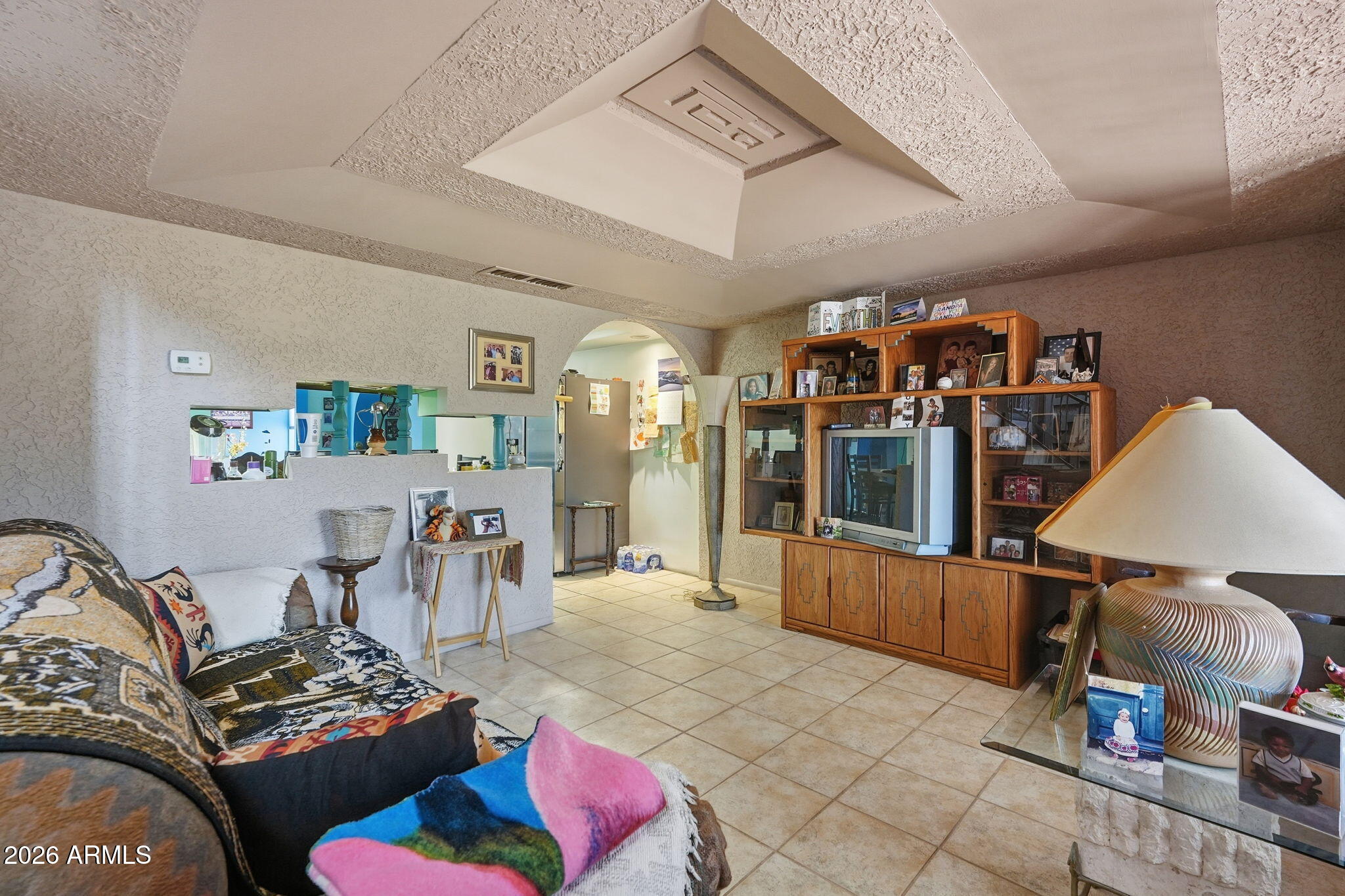 4702 East Alta Vista Road Phoenix, AZ 85042 - Photo 8 of 20 a living room with furniture and wooden floor