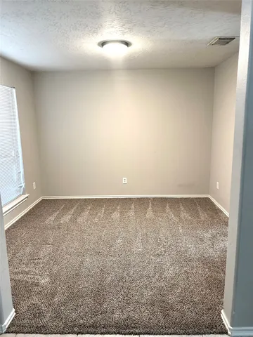 an empty room with a natural light